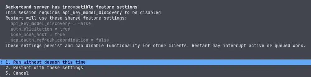 Prompt displayed when Codex CLI starts, requesting api_key_model_discovery disablement and asking whether to run without daemon or restart with updated settings