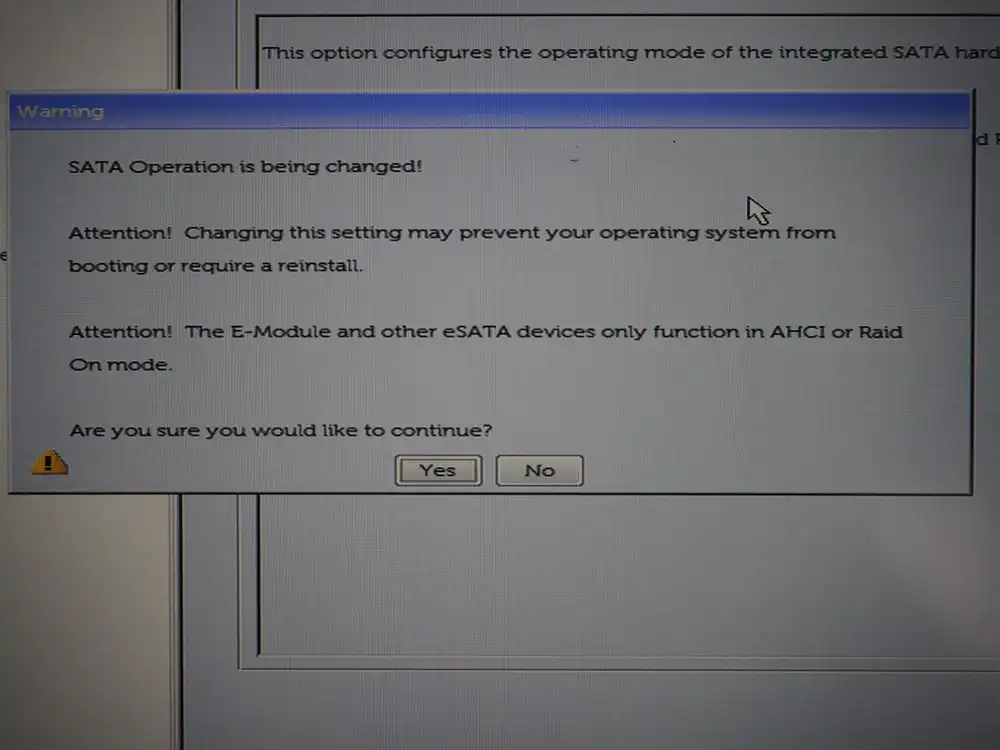 "SATA Operation is being changed! Attention! Changing this setting may prevent your operating system from booting..." warning dialog with Yes/No