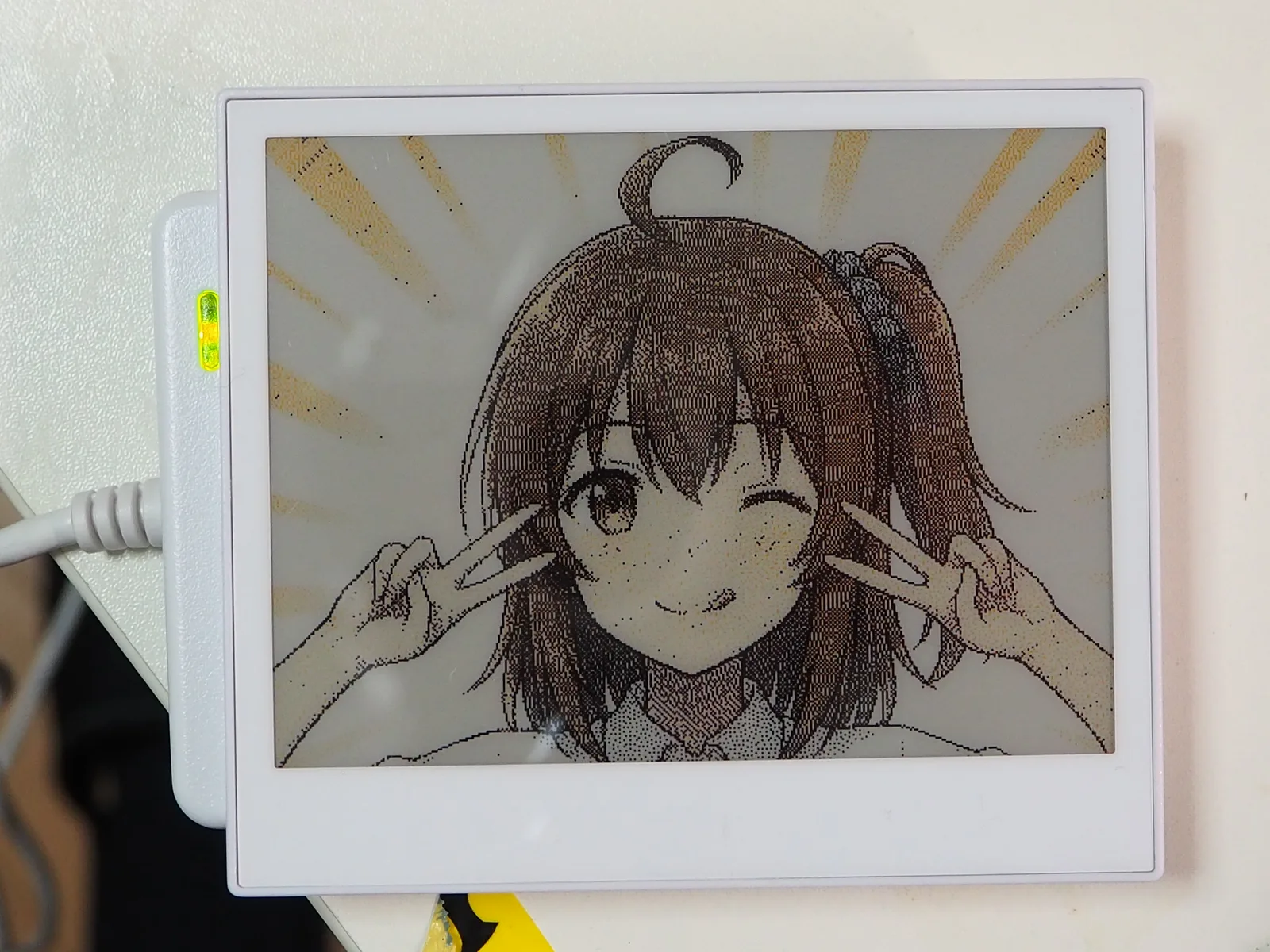 100円のリーダーの上で表示が書き換わったEZ Sign